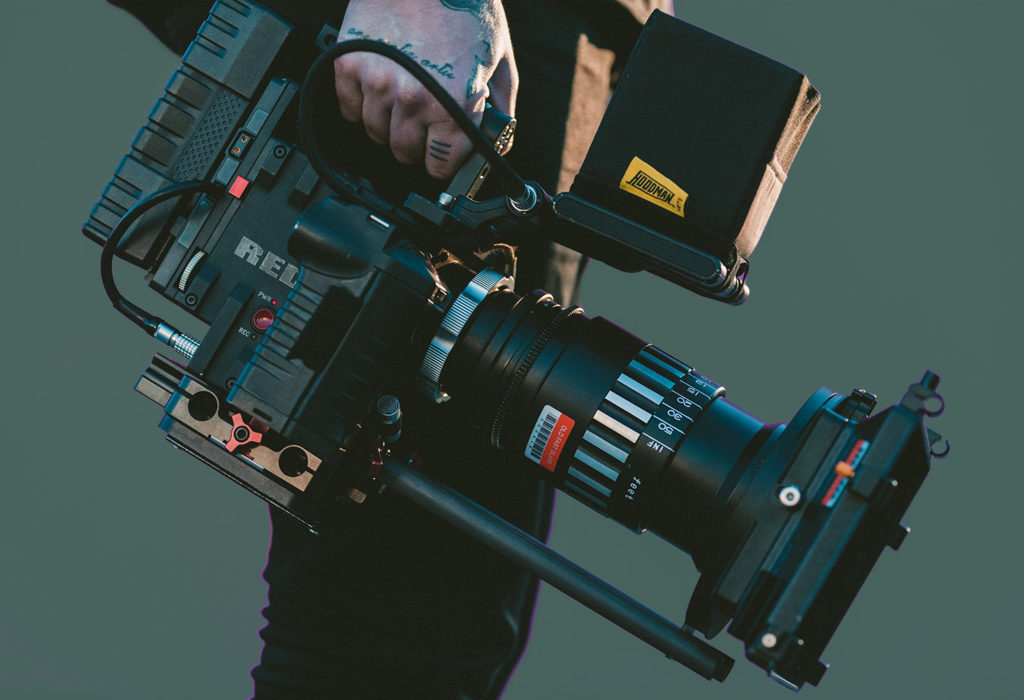 man holding video camera