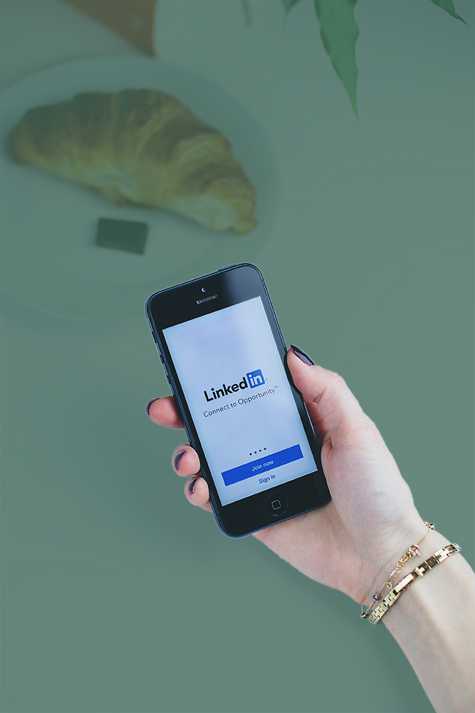 Phone with LinkedIn log in screen