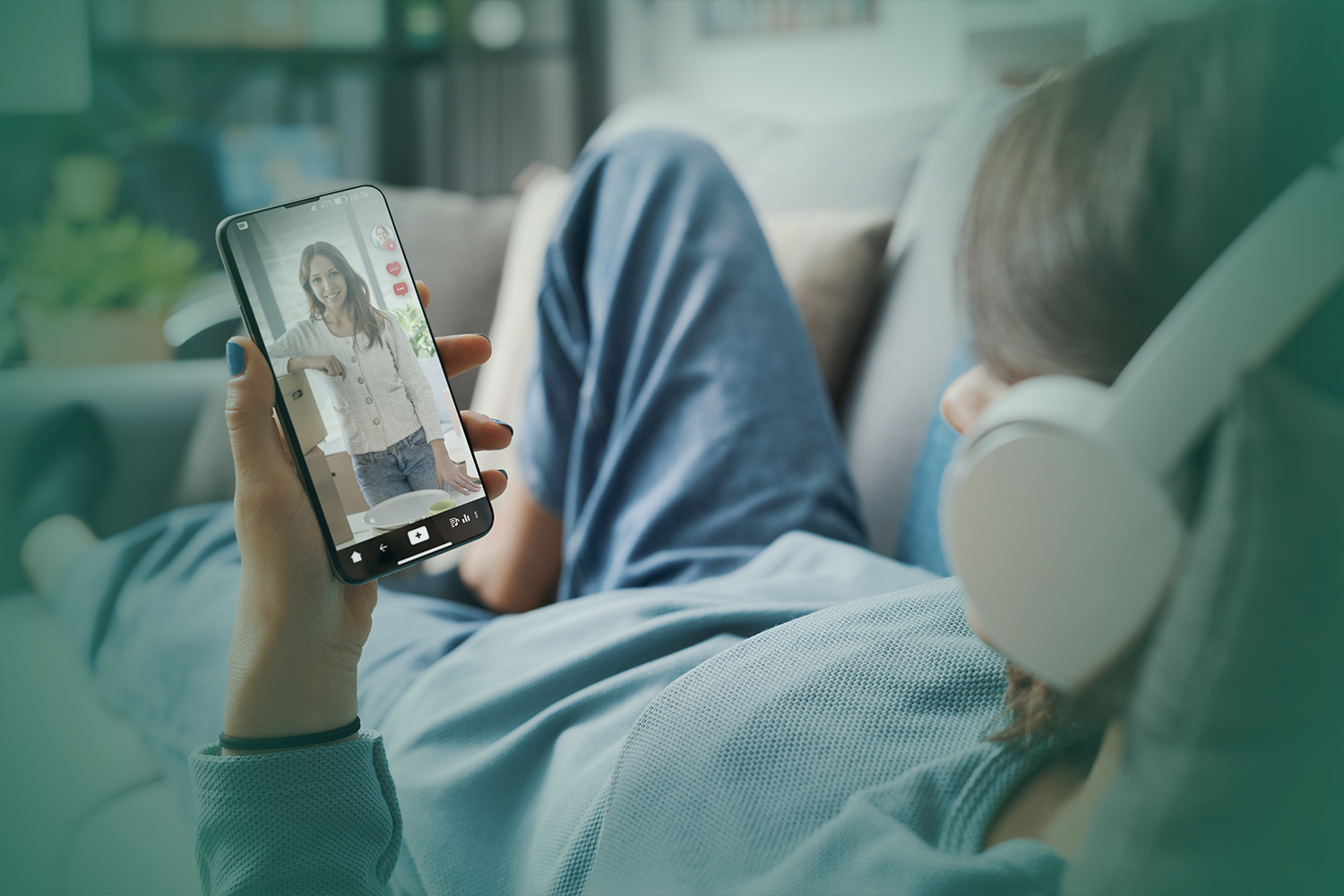 woman watching vertical video on social media